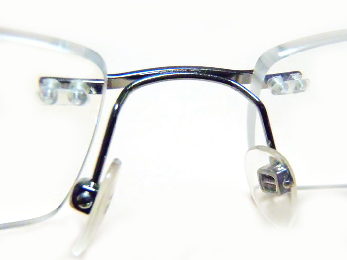 Frameless Eyeglasses with Plastic Caps on Nose bridge